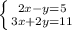 \left \{ {{2x-y=5} \atop {3x+2y=11}} \right. \\